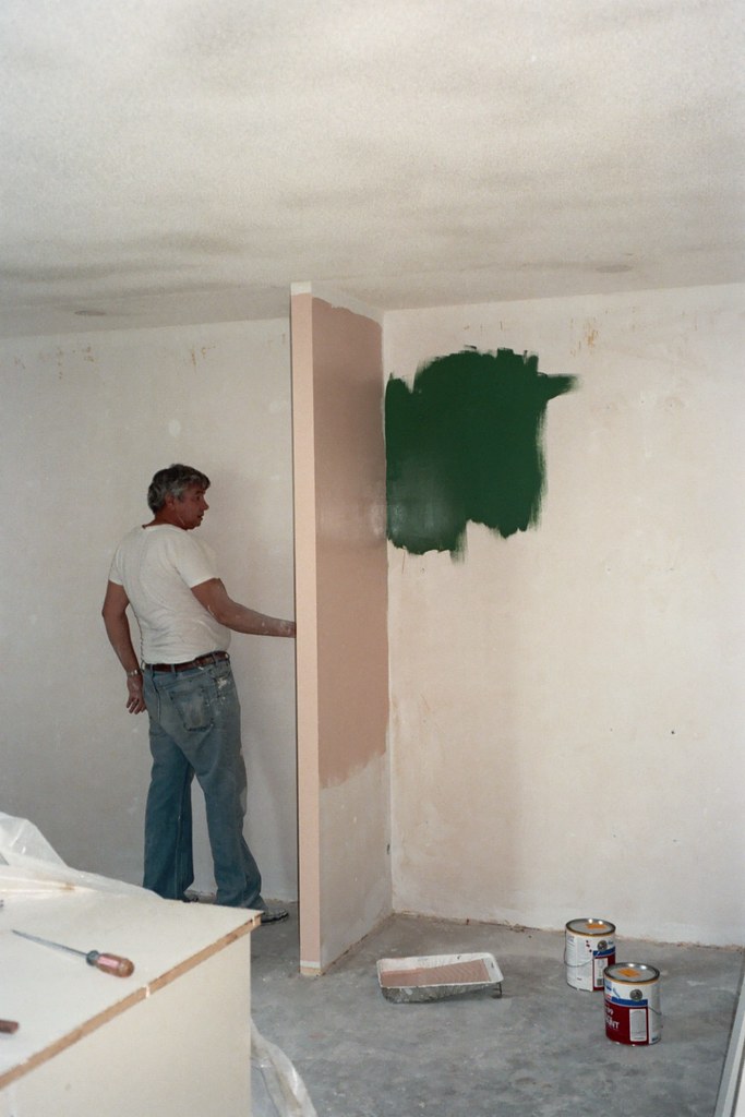 Testing a colour swatch on a wall before the full coat
